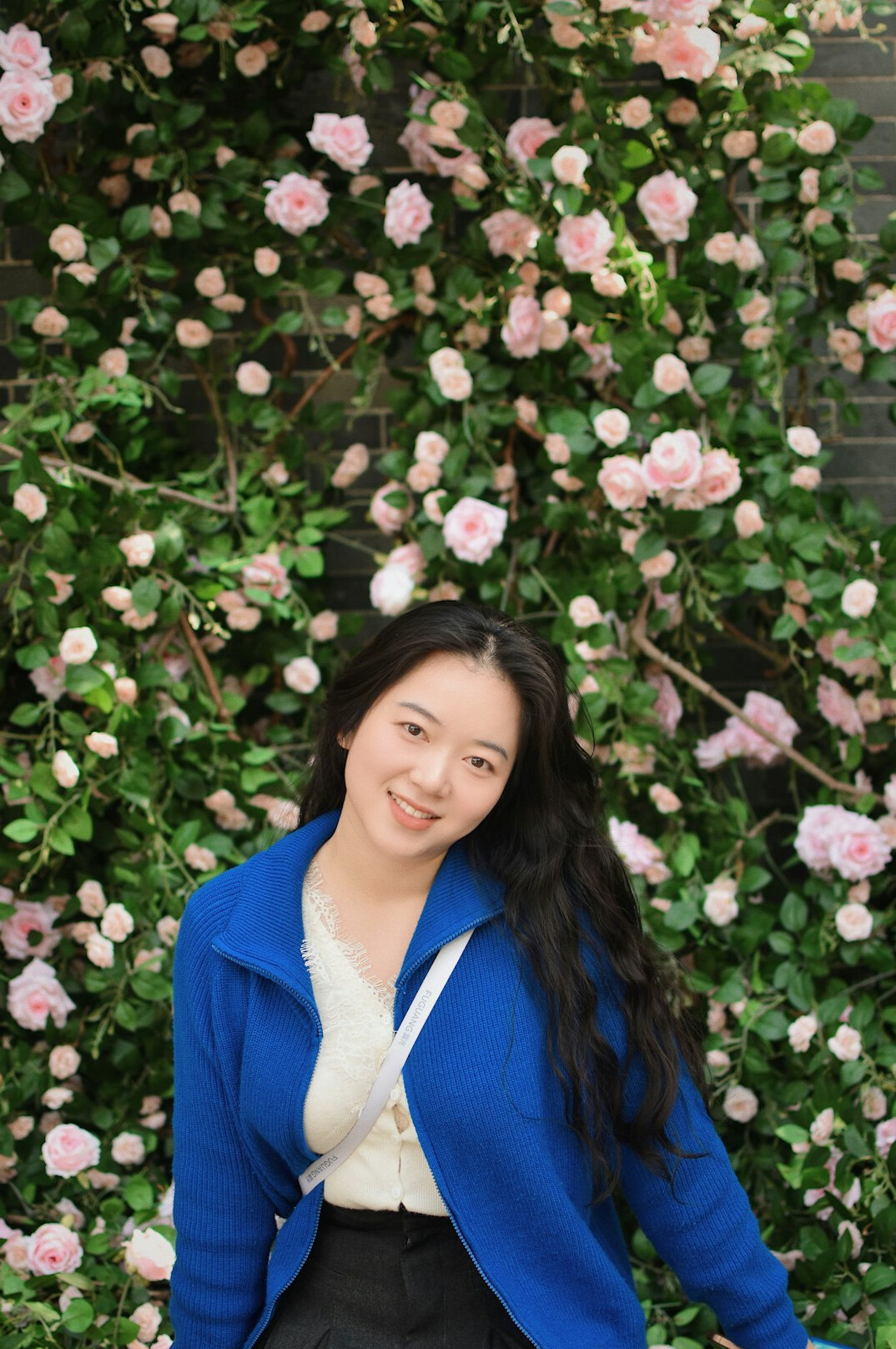 Portrait of a professional woman in a blazer smiling