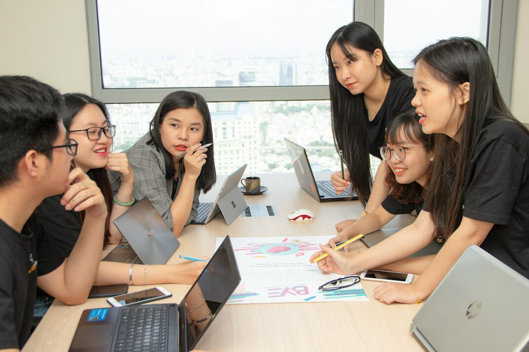 group of students learning coding