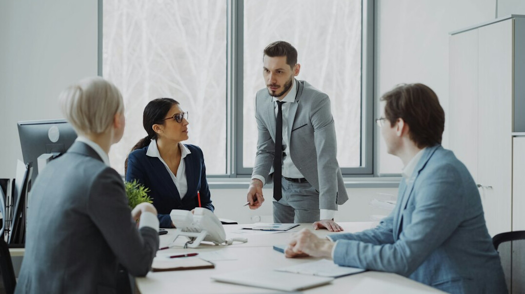 corporate team discussing software